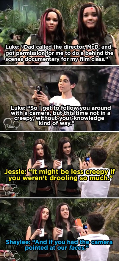 Luke pointing his camera at Jessie's chest
