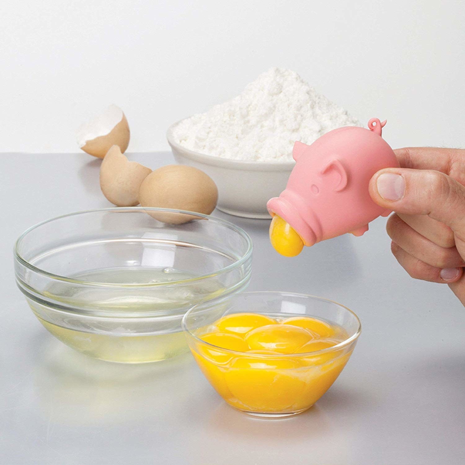 hand using the pig shaped separator 