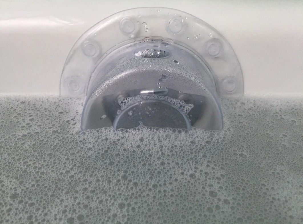 soap coming out of tub overflow cover