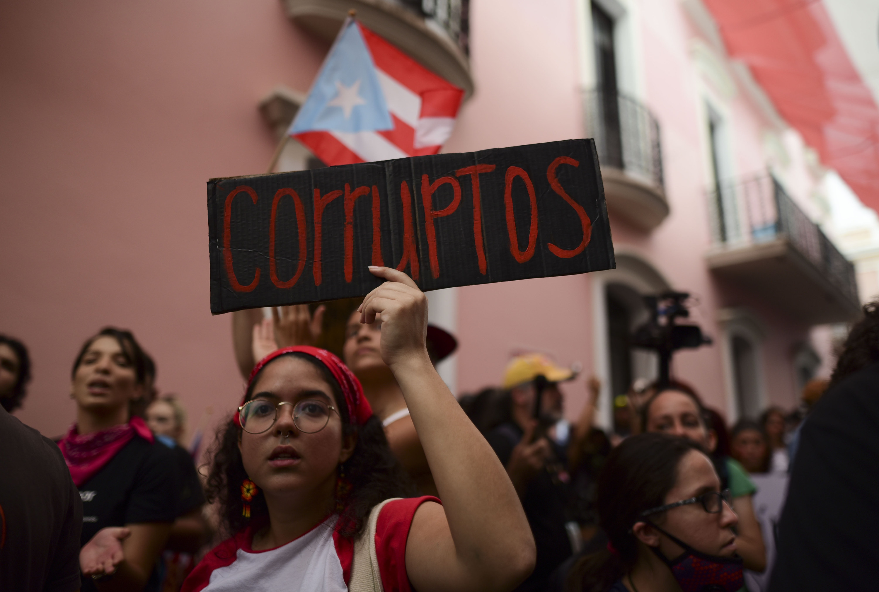 Puerto Ricans protest over unused emergency aid, demand