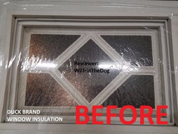 reviewer photo of the wrap taped to a window
