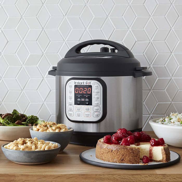 An Instant Pot surrounded by food
