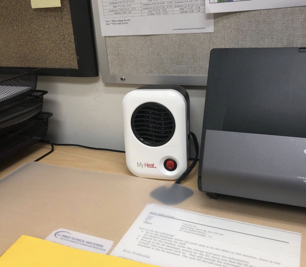 reviewer photo showing the mini heater