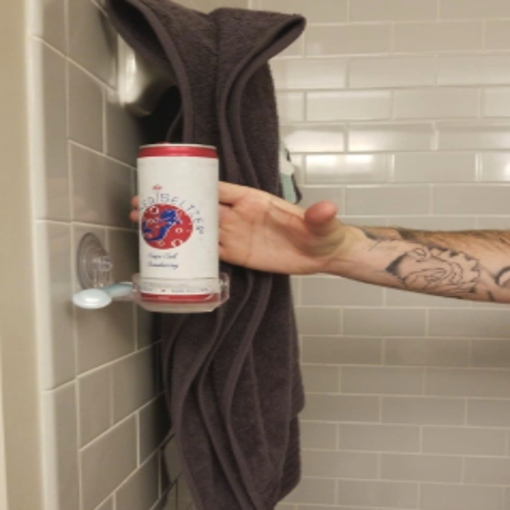 a reviewer reaching for a spiked seltzer while in the shower