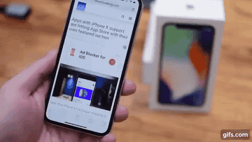 Person scrolling to top of the phone screen