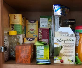 reviewer image of a cluttered kitchen cabinet