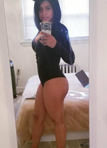 A customer review photo showing the full bodysuit