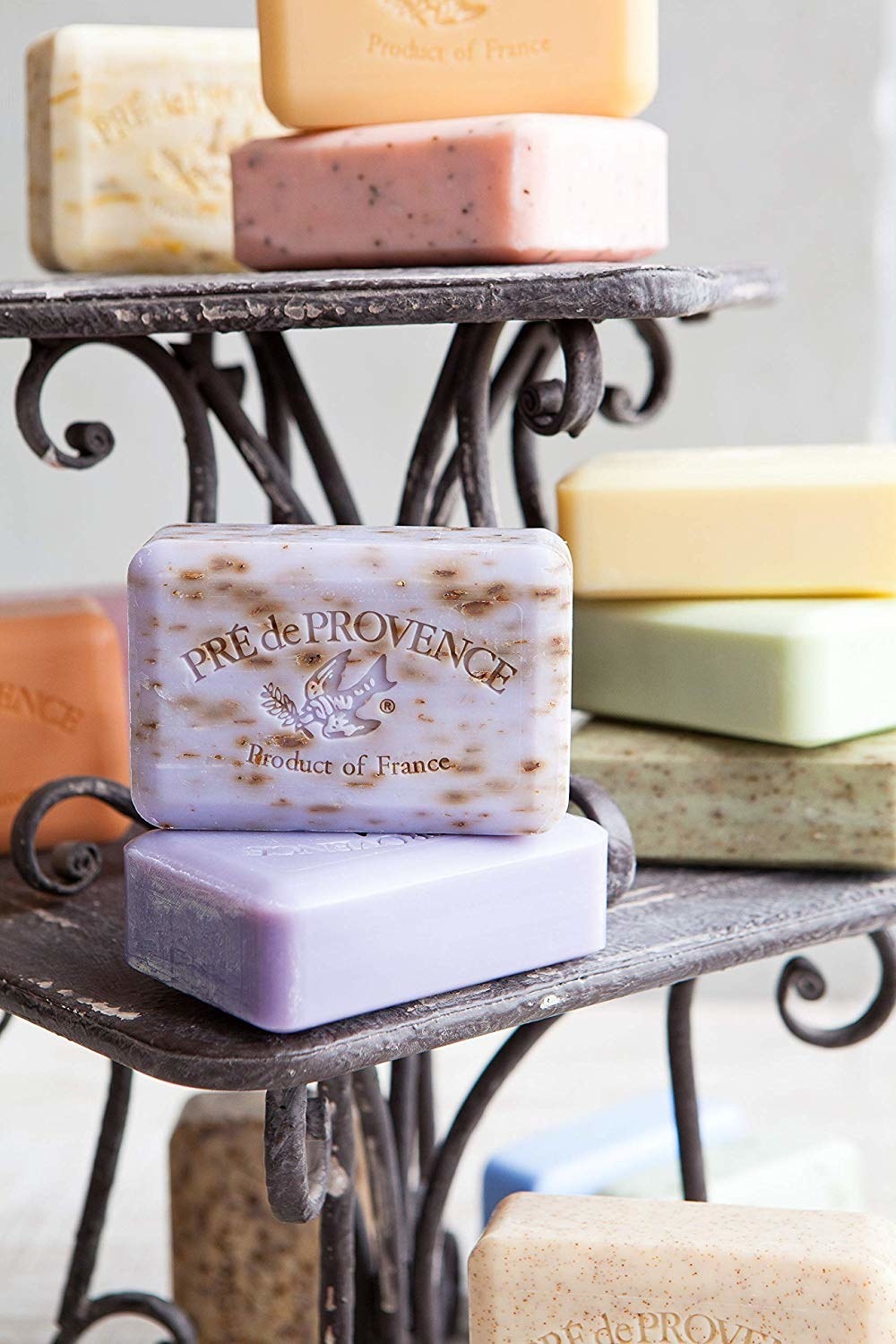 A stack of the colorful soaps engraved with a bird and &quot;Pre de Provence product of France&quot; logo