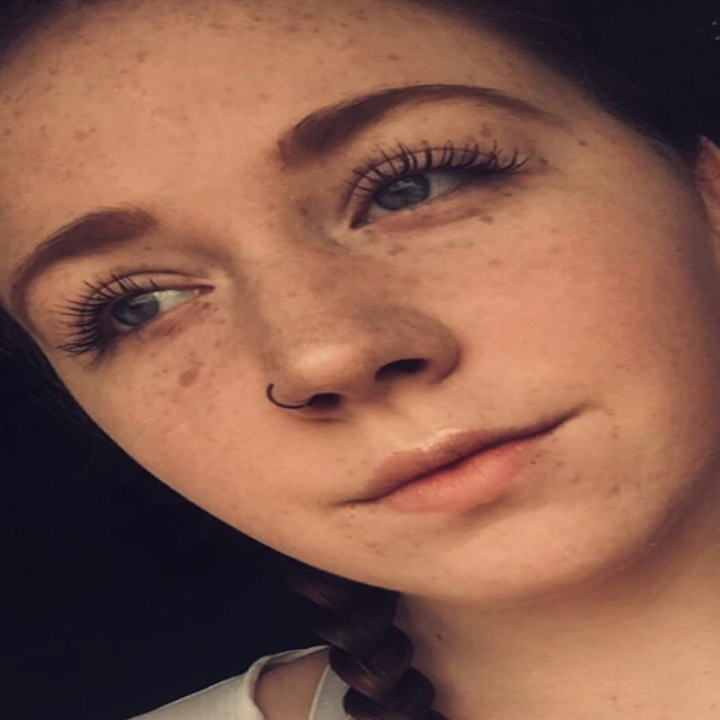 Reviewer with mascara on. Lashes curl over eyelids dramatically. 