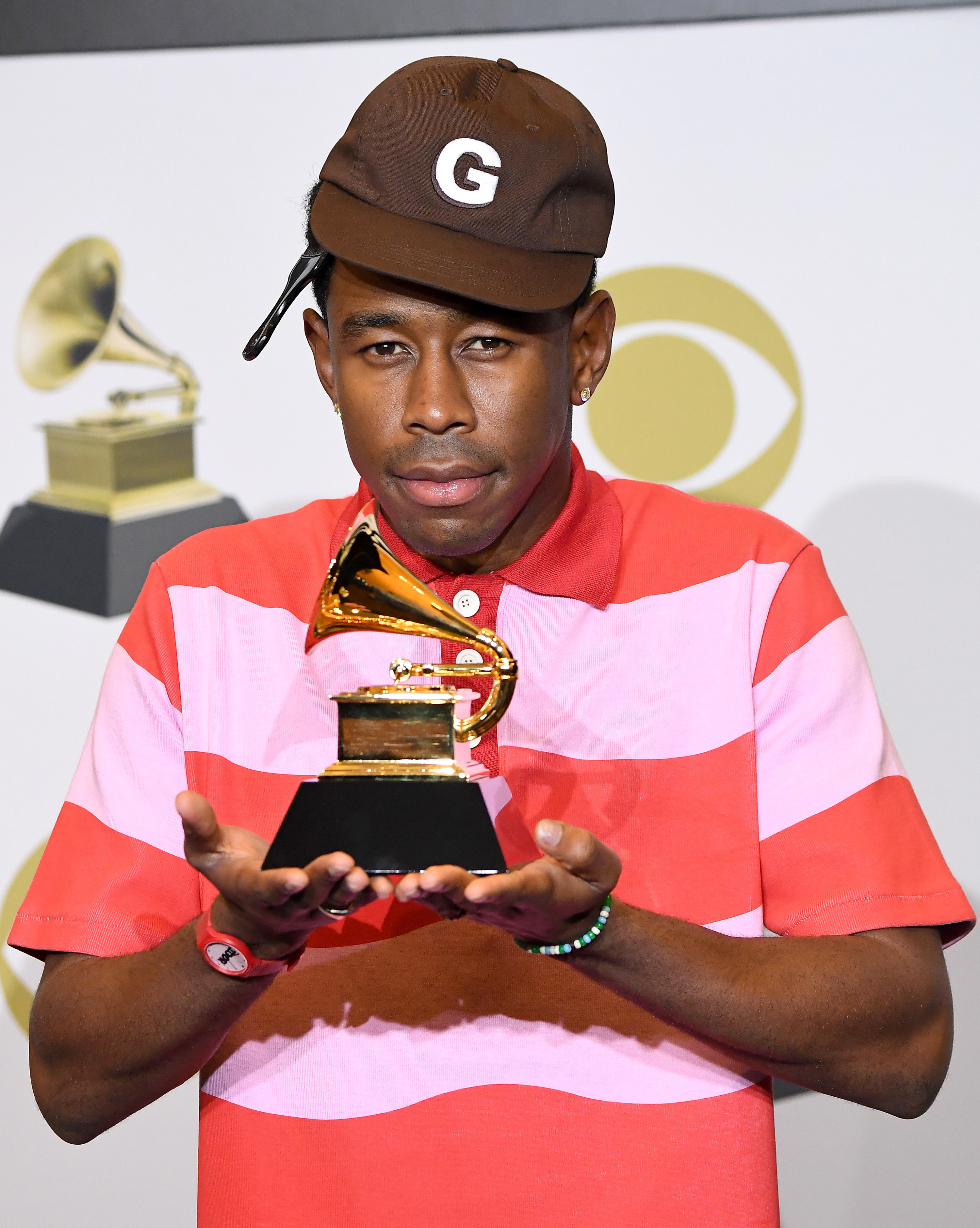 A chaotic way to hold a Grammy. : r/tylerthecreator