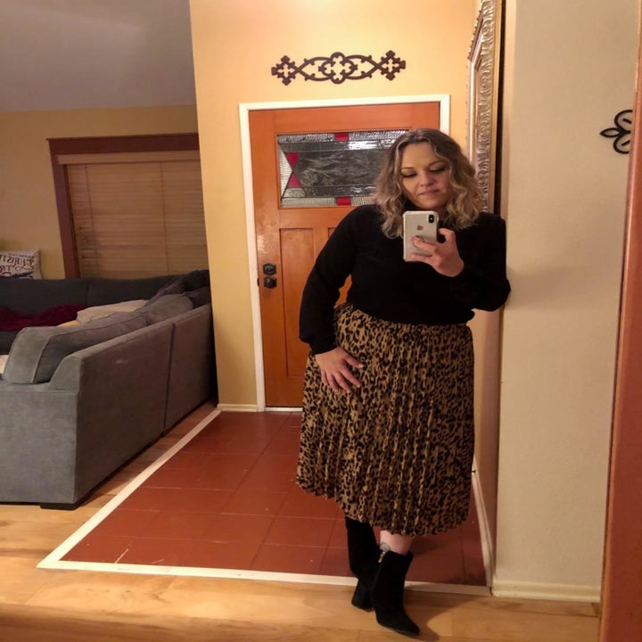 A different reviewer wearing the same skirt