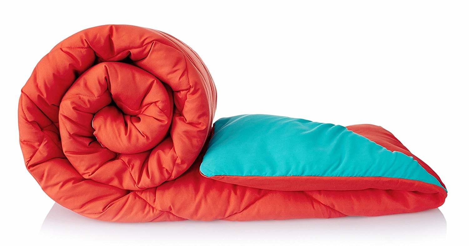 A comforter in red and blue.