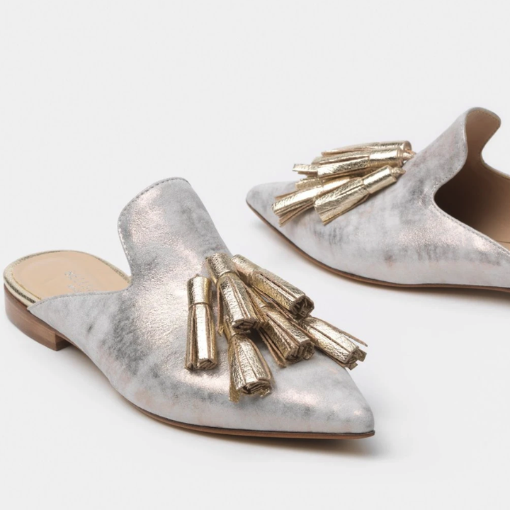 the mules with gold tassels 