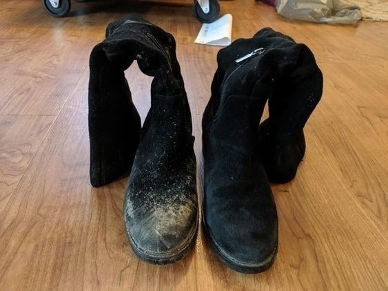 reviewer photo showing one boot completely cleaned using the brush while the other is covered in mud 