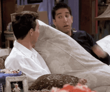 Ross demonstrating the hug and roll technique to Chandler in the show ‘Friends’.