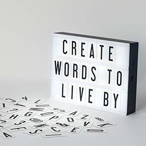 Light box with the words ‘Create words to live by’ spelled out using letter tiles