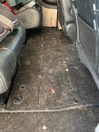 inside of reviewer's car with tons of pet fur on the floor