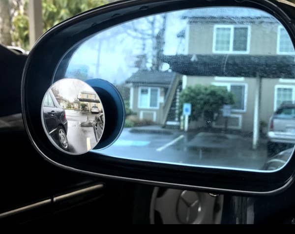 Review photo of the blind spot mirror attached to a car side mirror