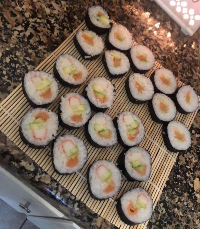 Bamboo board with homemade sushi on it