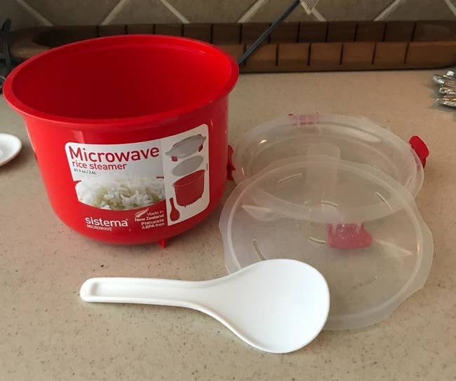 The bowl, plastic lids, and scoop