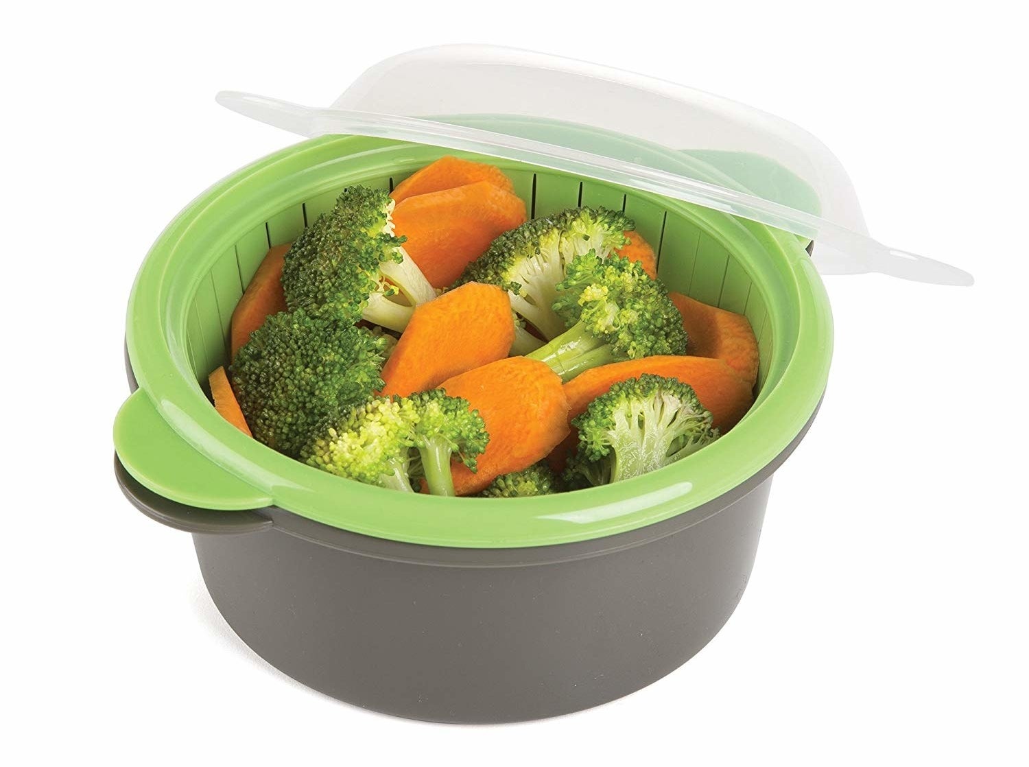Carrots and broccoli placed in microwavable veggie steamer