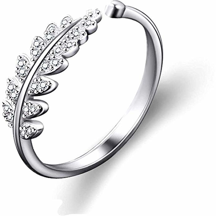 Silver ring with a studded leaf design.
