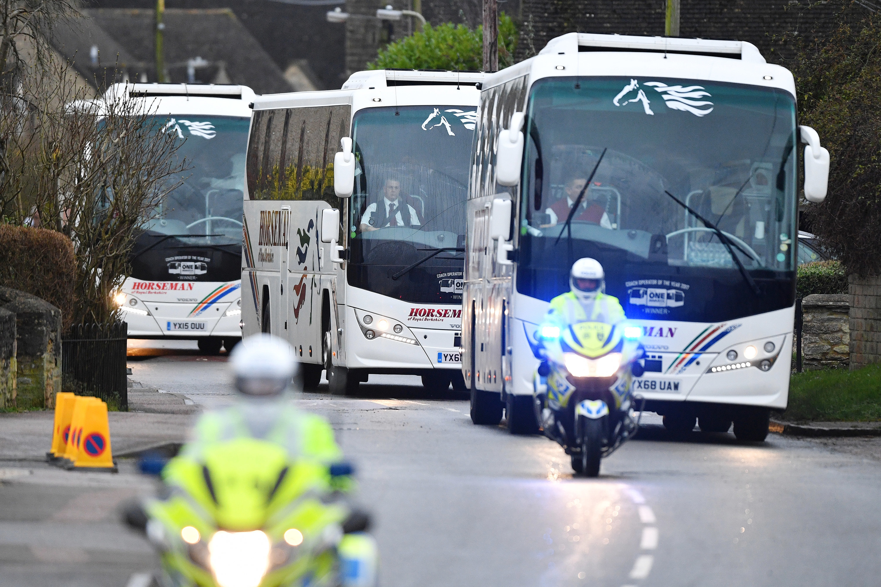 Coaches transport eighty-three Britons and 27 foreign nationals