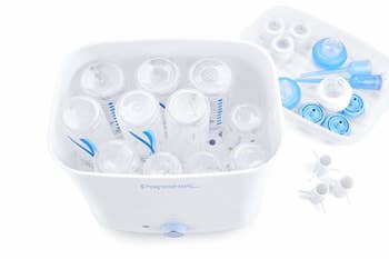 Inside presumption of sterilizer showing it packed with babe bottles