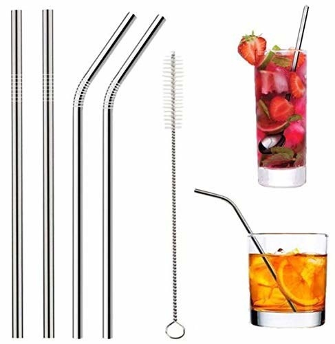 Two straight metal straws, two bent metal straws, a cleaning brush, and two glasses of drinks with metal straws in them