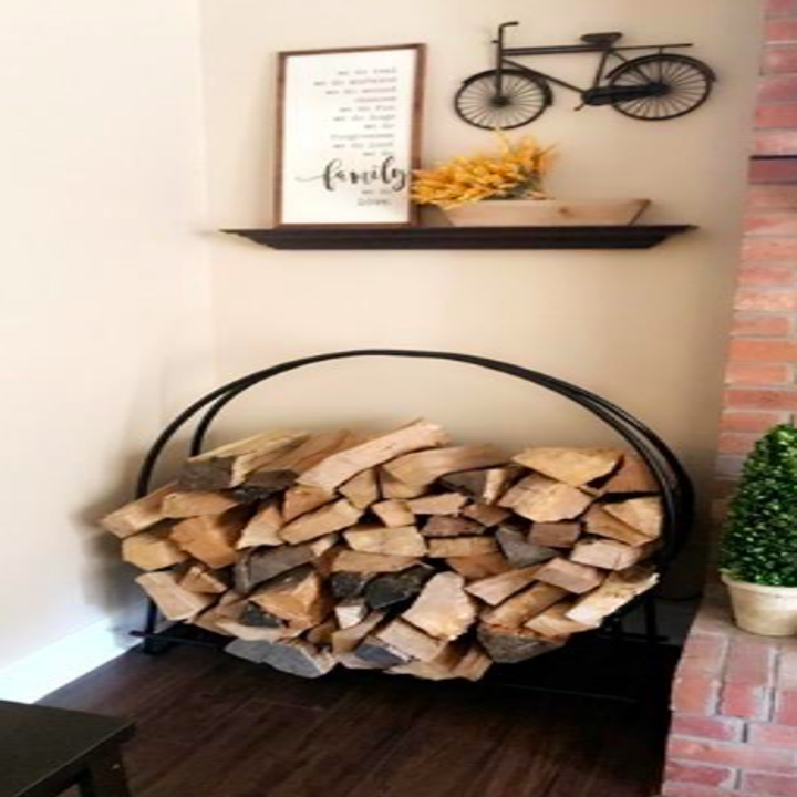 Reviewer's hoop filled with chopped logs and set in corner of living room 