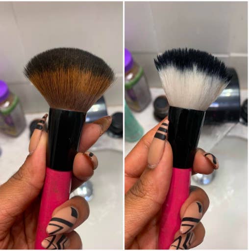 A reviewer holding a makeup brush that is brown with powder, then the same brush clean and white