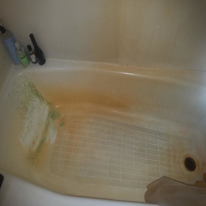 An iron and hard water-stained tub 