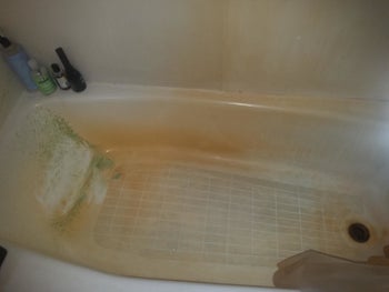 tub with yellow hard water stains 