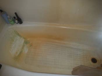 tub with yellow hard water stains 