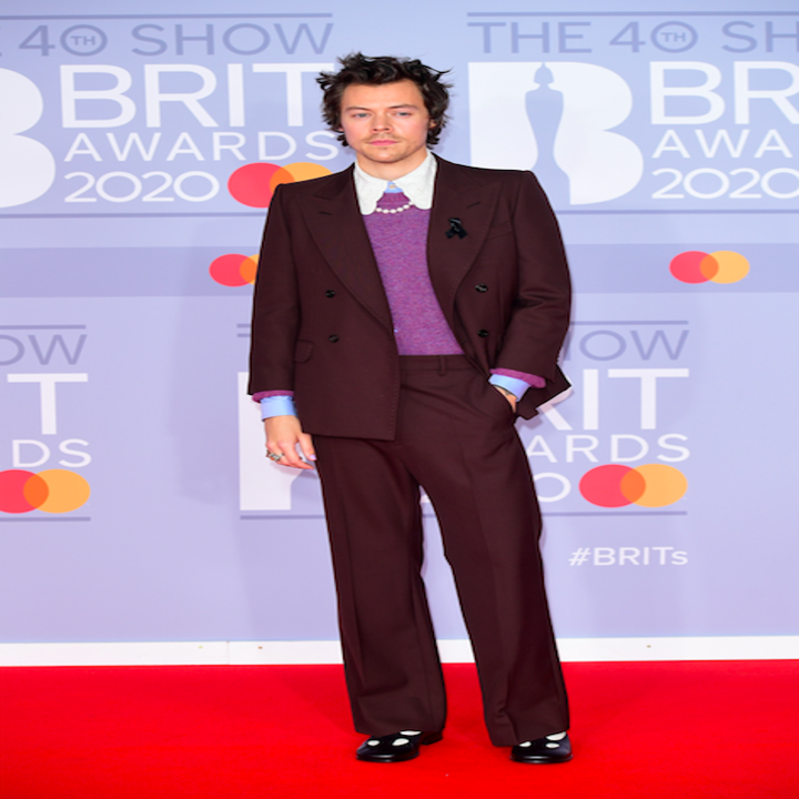 Harry Styles Seemed To Pay Tribute To Caroline Flack By Wearing A Black Ribbon At The Brits
