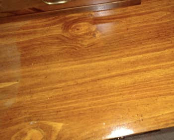 Watermark-covered finished wooden table