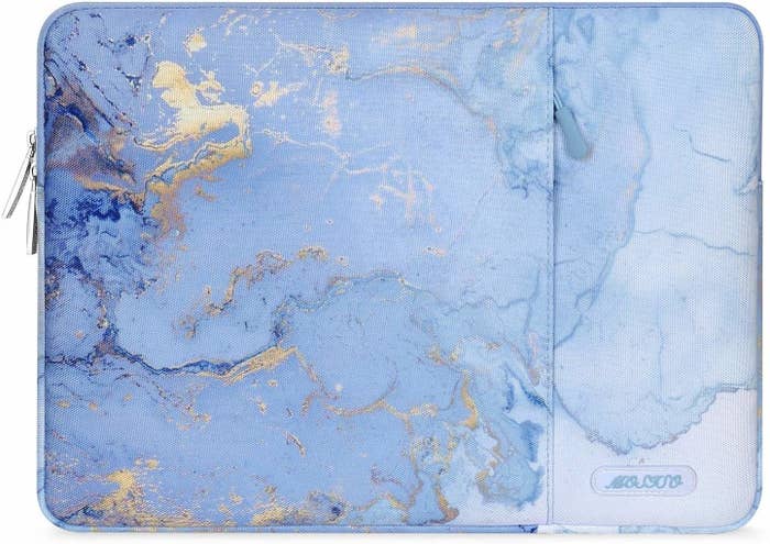 laptop sleeve with light blue and gold marble-like pattern