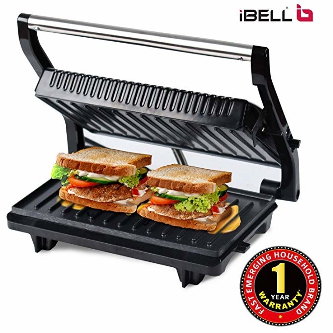A sandwich placed on the panini grill.