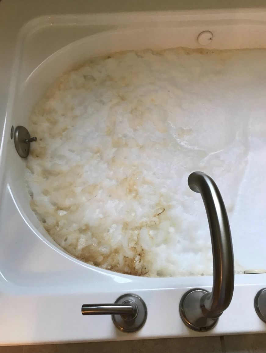 Jetted tub cleaner lifts up dirt and debris from the drain of a reviewer&#x27;s hot tub