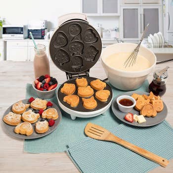 The round waffle maker and palm-sized waffles in the shape of dog, tiger, cat, deer, and panda faces
