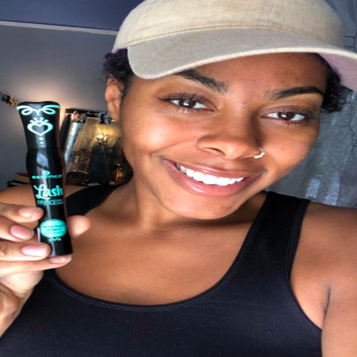 Different reviewer holding mascara tube up to camera