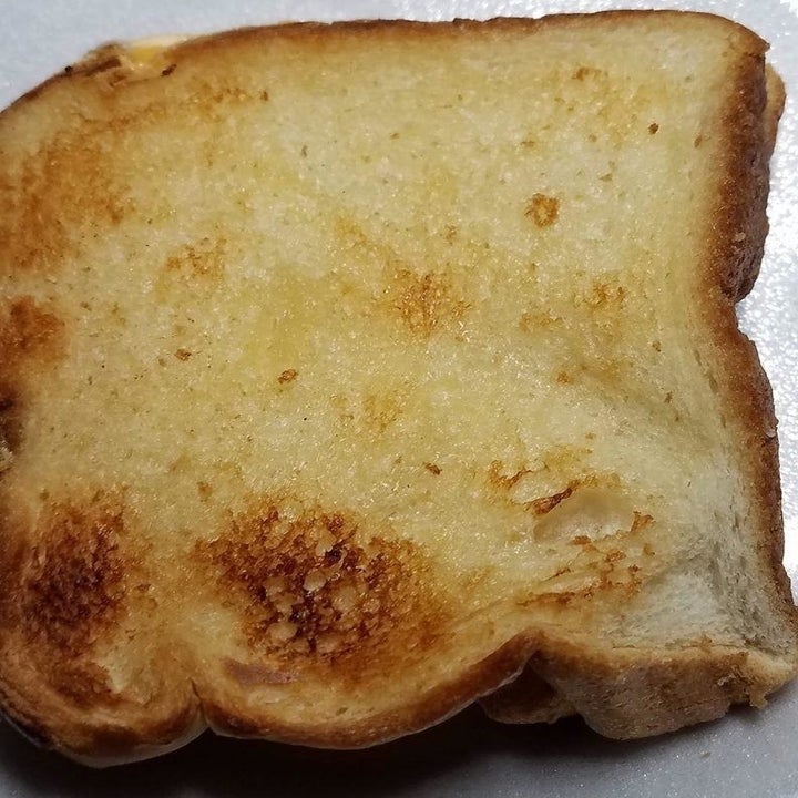 a reviewer photo of a grilled cheese that was made using the toaster bags