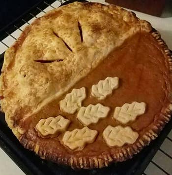a reviewer photo of a split decision pie they made in the pan