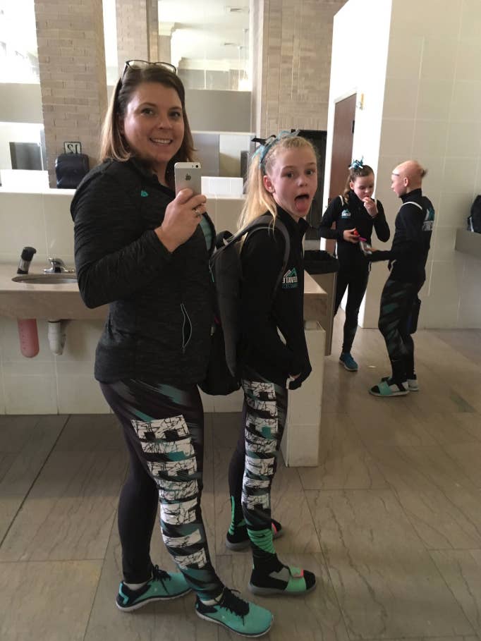 Nicole Clemens with her daughter posing in matching sportswear 