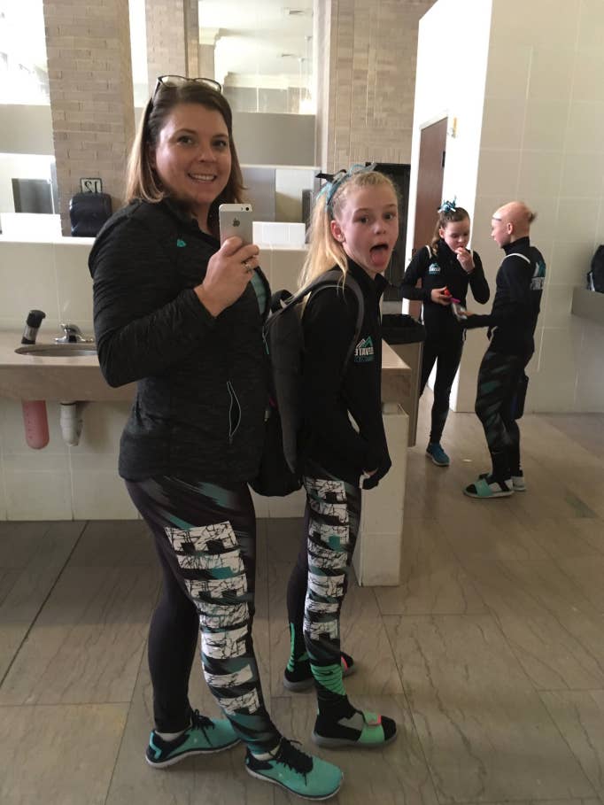 Nicole Clemens with her daughter posing in matching sportswear