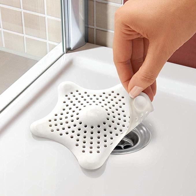 White star shaped silicone hair catcher.