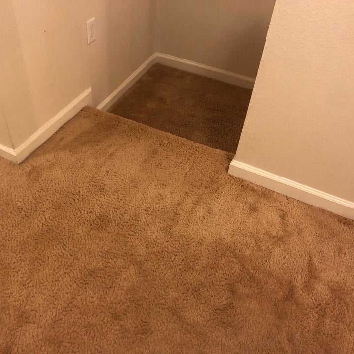 same reviewer showing wall and carpet looking brand new after using the spray 
