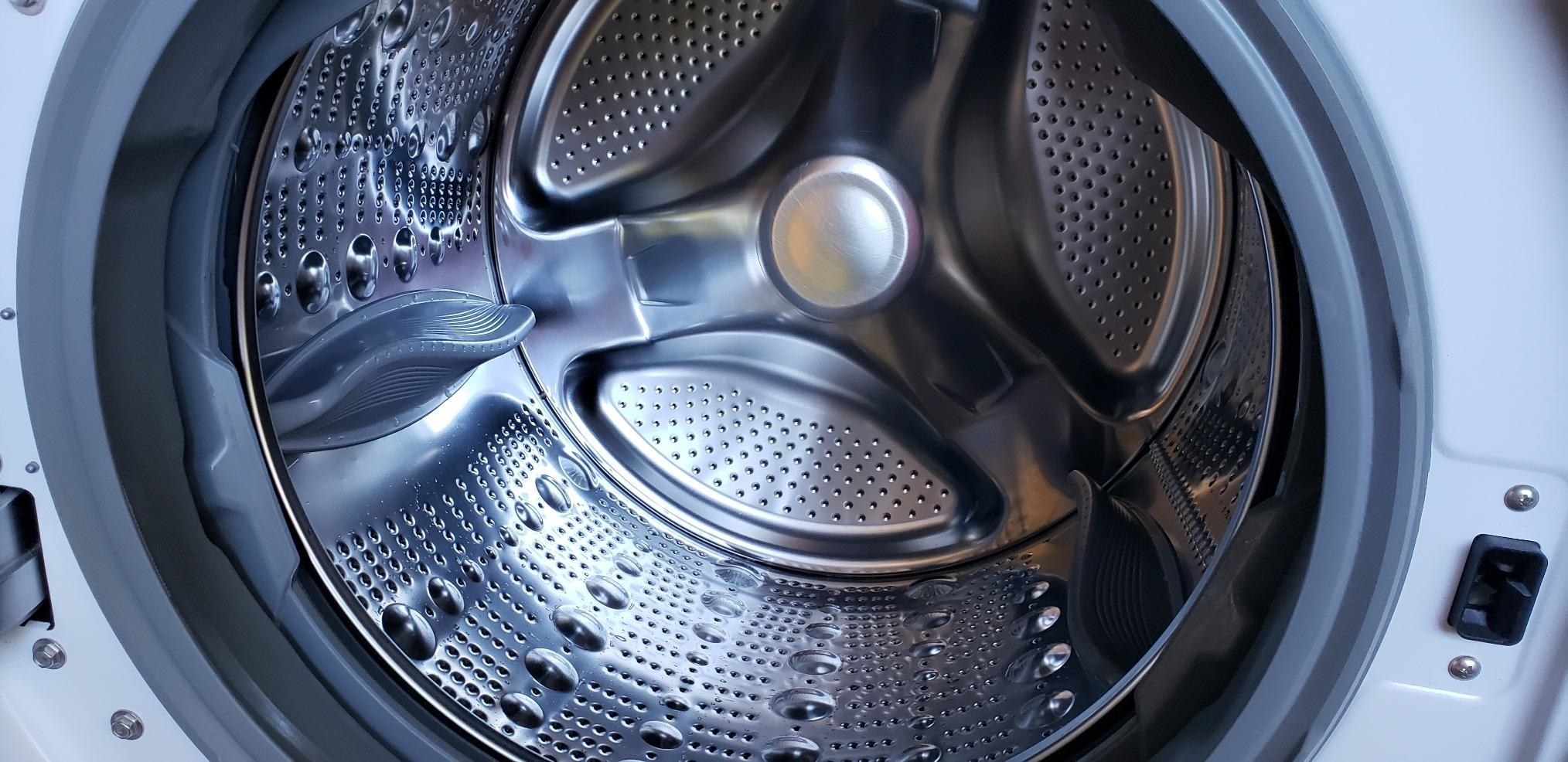 the sparklingly clean inside of a washing machine