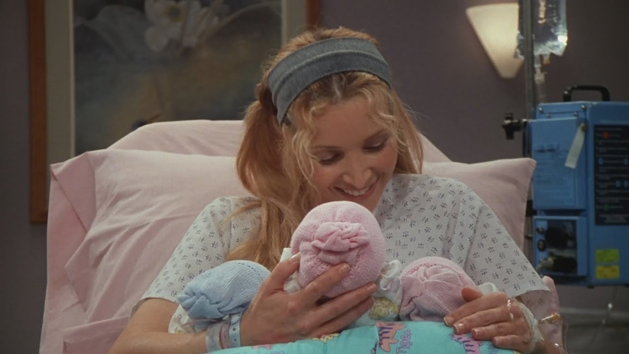 phoebe talking to the babies in her arms