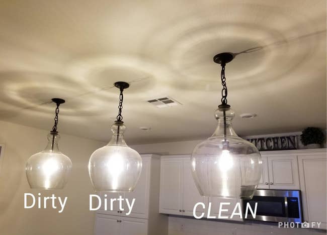Three glass pendant lights: two that are cloudy and one that is clean